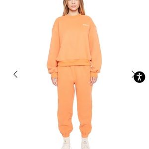 Danielle Guizio sweatsuit in sunburst sz S